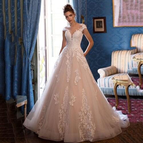 Illusion Scoop Neck Cap Sleeve Wedding Dresses 2020 Robe De Mariage Elegant Appliqued Lace Bridal Gowns Tulle Custom Made
