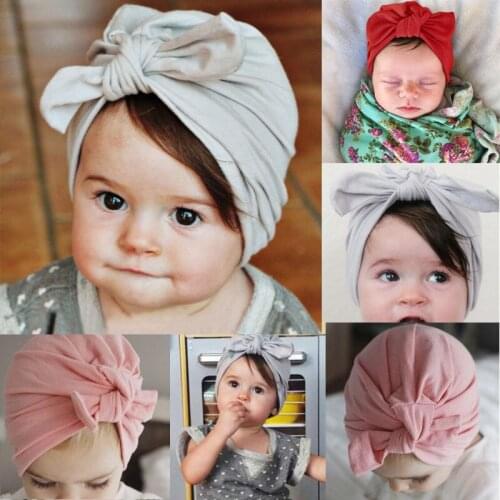 2017 Pudcoco Fashion Baby Hats Caps Solid Cute Newborn Baby Toddler Kid Boy Girl Infant Bowknot Soft Cotton Beanie Hat Cap 0-6T