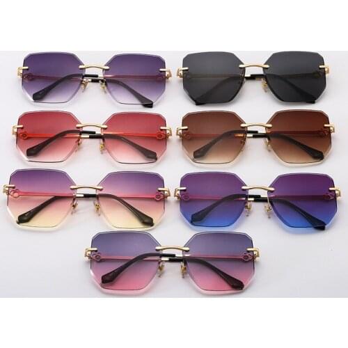 New Fashion Womens Frameless Cut Edge Sunglasses Ocean Lens Sunglasses Personality Polygon Glasses