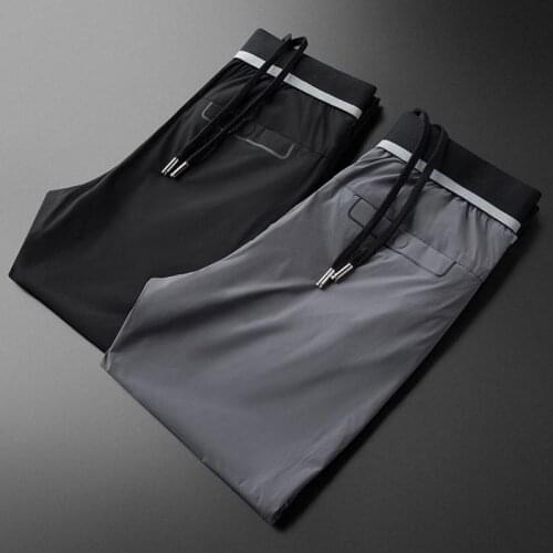 Classic Summer Thin Mens Pants Luxury Black Grey Solid Color Casual Male Pants 40 Elastic Waist Slim Man Trousers