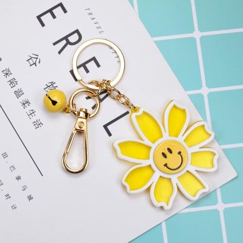 INS acrylic Japanese creative doll key chain sunflower smiling face key chain lady bag pendant gift