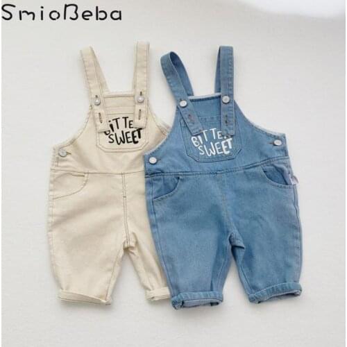 Ins Spring New Korean Baby Boys And Girls Rompers Fashion Letter Pocket Loose Denim Strap Pants Unisex Sport Jumpsuits Japan Kid