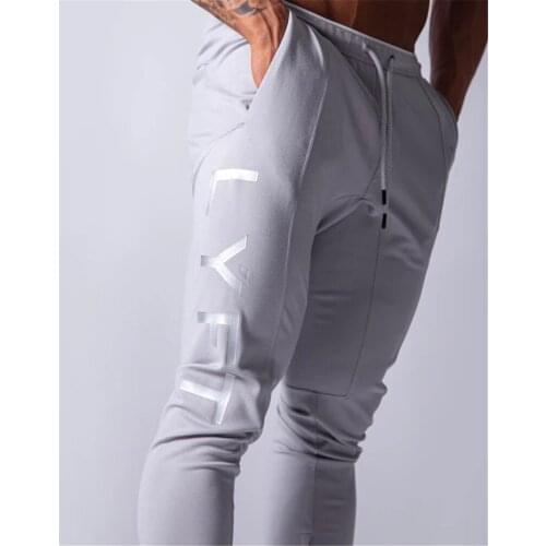 Mens new sports pants, mens jogging fitness sports pants, new printing fashion, muscle mens fitness training pants