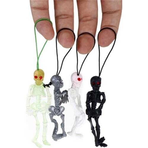 2pcs/lot Rubber scaryskull toys mini Luminous Glow In The Dark Skeleton Hanging Decoration