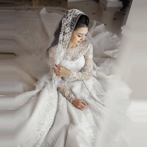 Elegant White Lace Wedding Dresses See Thru Long Sleeves Flowers Bridal Wedding Gowns In Glitter Dubai Puffy Ball Gown
