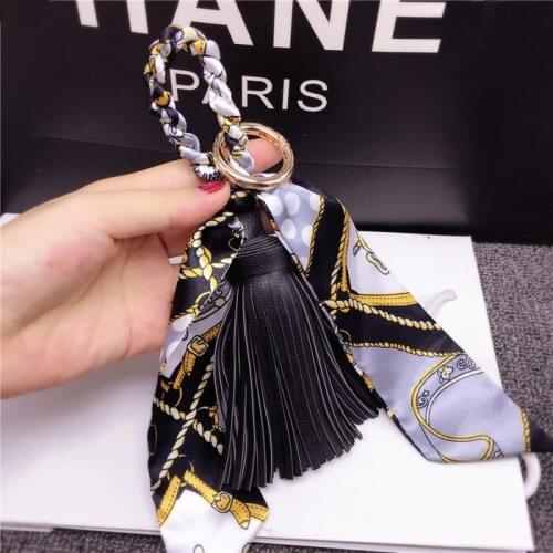 2021 New High Quality Fashion Scarves Key holder Ribbon Bowknot Exquisite PU Leather Tassels Keychains Women Bag Charm Pendant