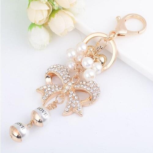 Creative New Alloy Bow Modeling Full Diamond Keychain Girls Fashion Bag Pendant Imitation Pearls Key Chain Adornment