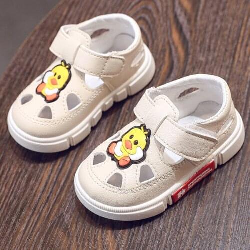 Spring and summer baby walking shoes soft soled anti slip baby hole shoes boys and girls hollow out single shoes Velcro leather