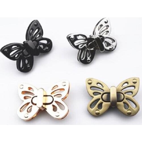 10 pcs/lot) New 4-color luggage handbag hardware butterfly style rotating decorative lock accessory bag DIY transformation lock
