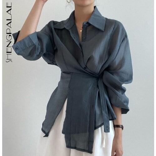 SHENGPALAE White Irregular Blouse Womens Autumn 2021 New Lapel Loose Single Breasted Lace Up Long Sleeve Shirt Female 5E2076