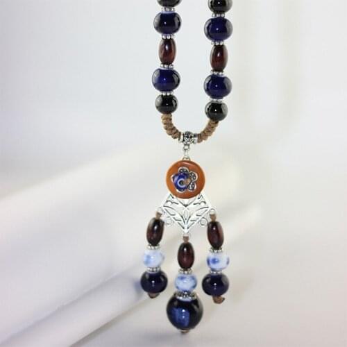 12 Pieces/LotSilver Hollow Flower Necklace Long Tassel Sweater Charm Statement Choker Ceramic Round Beads Women Fashion Jewelry