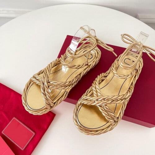 New spring and summer hand-woven sandals latest golden big rivet elements ladies strappy sandals beach shoes