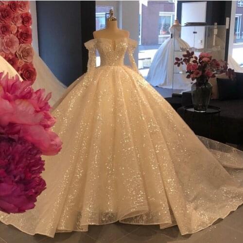 2021 Glitter Ivory Pearls Wedding Dresses Sequins Beaded Ball Gown Church Bridal Gowns Long Sleeves Extra Puffy