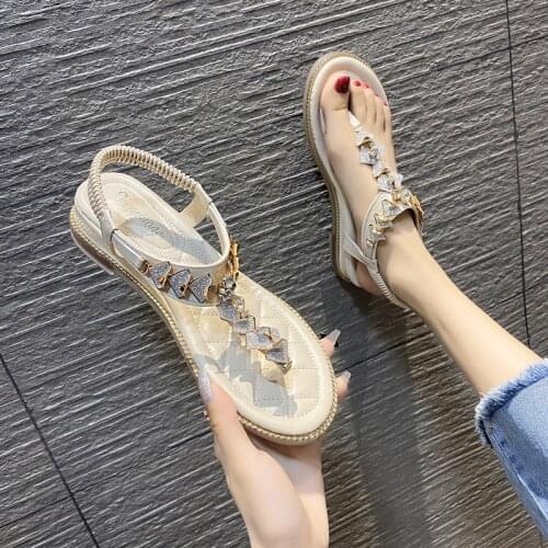 The new summer net red flat-bottomed temperament Roman French beach shoes