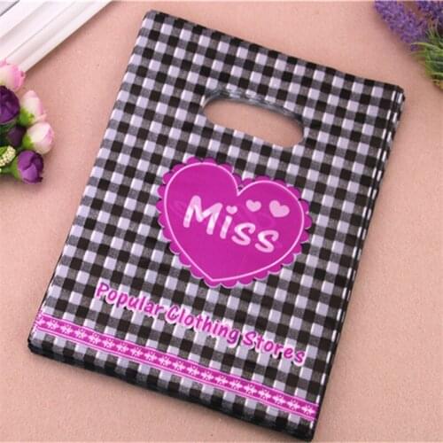 2021 New Design Wholesale 100pcs/lot 20*25cm Fashion Hot Pink Love Heart Bags With Handles Plastic Clothing Packaging Bags