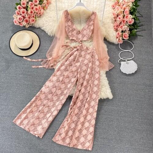 Holiday style suit 2021 summer new mesh stitching deep V-neck short print top + two wide-leg trousers