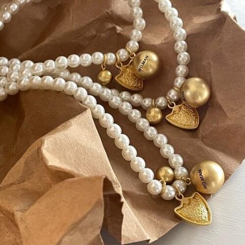 Imitation pearl retro metal accessories with golden old style retro necklace