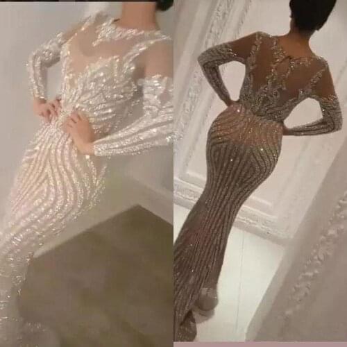 2020 Luxury Long Sleeve Sequins Silver Mermaid Prom Dresses Sexy Sheer Jewel Neck Evening Wear Beads Celebrity Prom Gowns