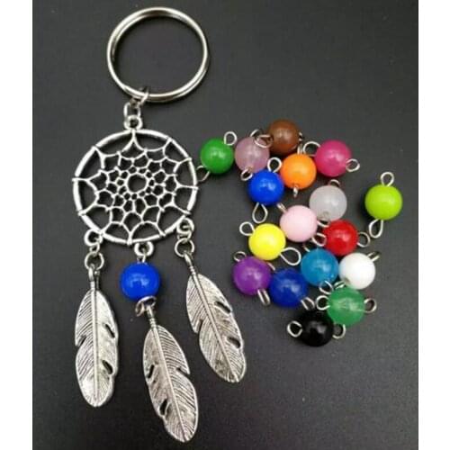 1 Pcs/Lot Mixed color glass beads dreamcatcher keyring bag charm fashion boho style jewelry feather keychain for women