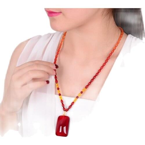 Honey wax pendant mens and womens blood glass pendant sweater chain amber long necklaces matching with blood peroxide Pendant