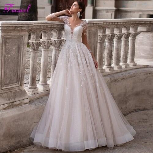 Fsuzwel Romantic Scoop Neck Backless A-Line Wedding Dress 2021 Gorgeous Long Sleeve Appliques Sparkly Tulle Vintage Bridal Gown