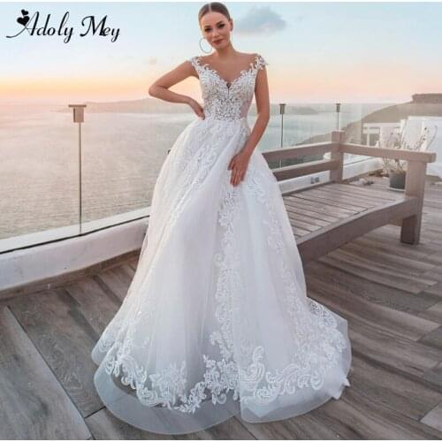 Adoly Mey Romantic Scoop Neck Button A-Line Wedding Dress 2020 Luxury Appliques Court Train Bridal Gown Customized Wedding Gowns