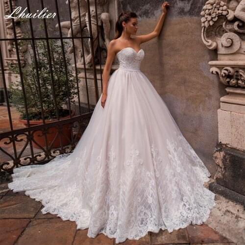 Lhuilier A Line Strapless Lace Appliques Wedding Dresses 2020 Beaded Floor Length Bridal Gowns with Removable Lace Jacket
