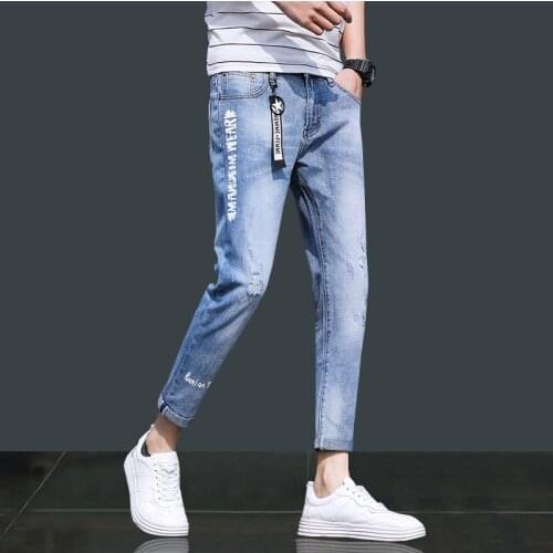 Denim jeans mens summer 2021 fashion brand Slim feet mens casual ripped pants Korean trend thin teenagers pencil pants