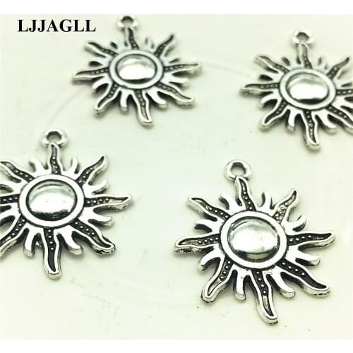LJJAGLL 100pcs/lot 24*28mm Vintage Sun Charm Silver Plate Zinc Alloy Pendant DIY Jewelry necklace Findings AXX007
