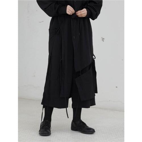 Spring and Autumn ladies solid color multi-strap design asymmetrical irregular straps wide leg pants loose nine split skirt