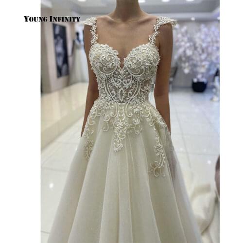 Elegant A Line Wedding Dress 2020 Bridal Gown Sweetheart Cap Sleeves Lace Applique White Bride Dress Custom Made Chapel Train