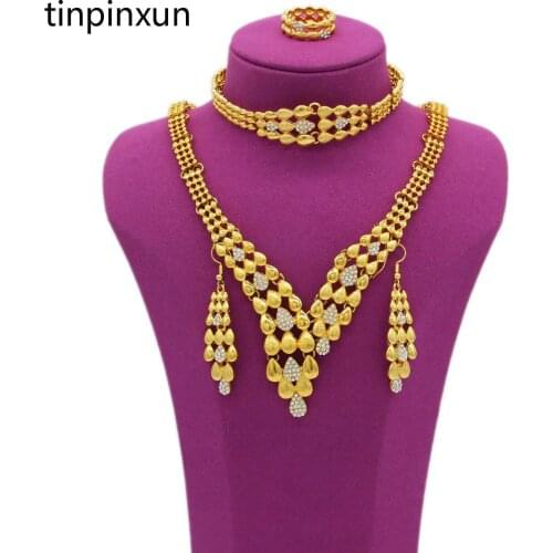 PINXUN African Dubai Gold Jewelry Set Women Necklace Bracelet Earring Ring Set Nigerian Party Gift Wedding Jewelry Sets YS2