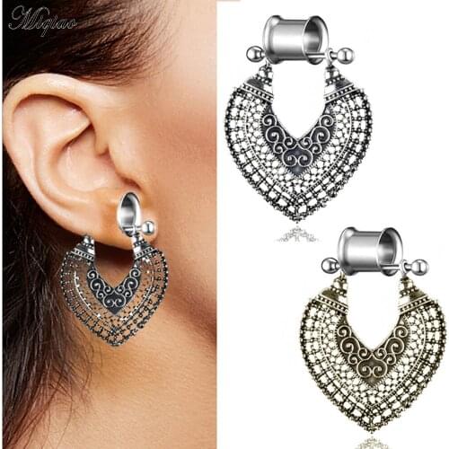 Miqiao New hot sale double trumpet auricle earrings retro love pendant hollow ear expansion body puncture jewelry