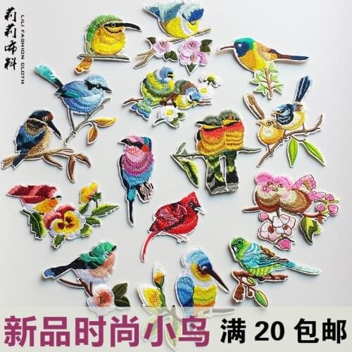 The birds are embroidered cloth paste clothes decoration patch hole trumpet applique DIY iron stick adhesive materials
