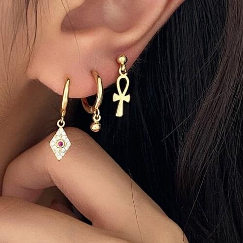 WTLTC 2021 Hot CZ Stone Small Huggie Earrings for Women Mini Rhombus Ear Piercing Earrings Drop Tiny Helix Cartilage Earrings