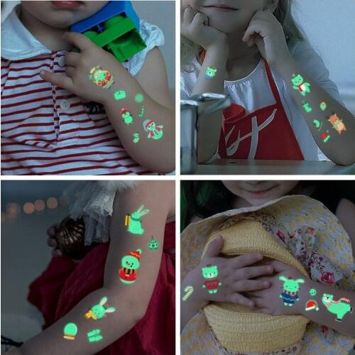 New Childrens luminous toys Christmas luminous tattoo stickers Snowman Penguin facial simulation cartoon stickers