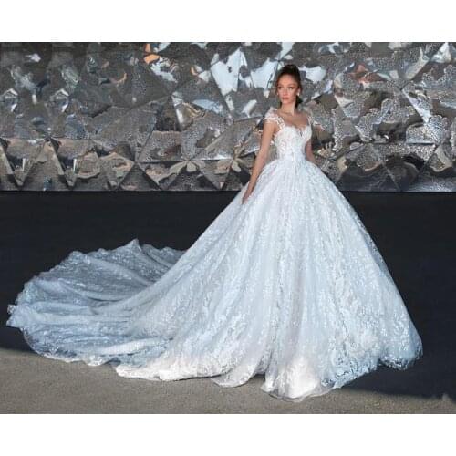 2021 Crystal Design Ball Gown Wedding Dresses Sheer Jewel Neck Capped Appliqued Lace Bridal Gowns Custom Made