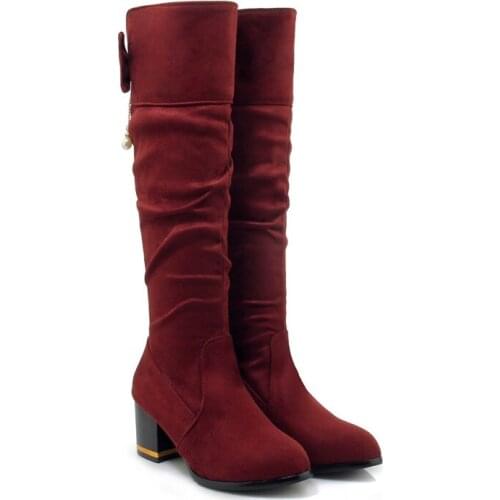 Big Size Euro-American wind pointed thick heel bow metal decoration thin high boots