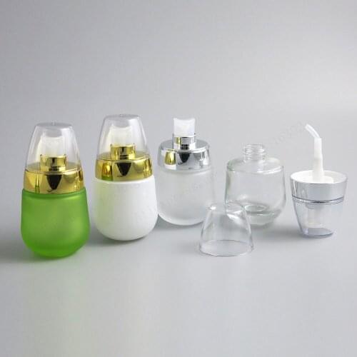 100 x 30ml empty glass lotion bottle container 1oz clear green glass bottle with silver lotion pump glass cosmetic container