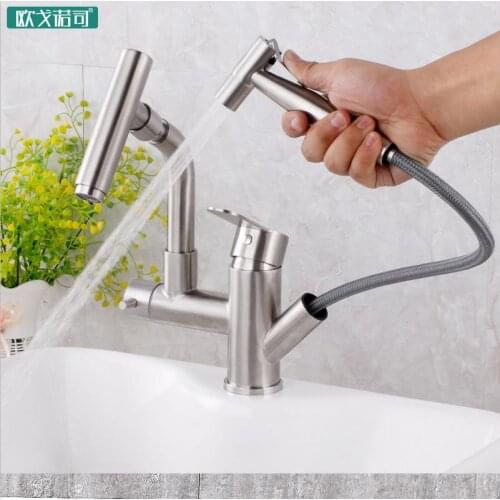 Pull out bathroom basin faucet has spray gun flexible hose hot and cold water 304 stainless steel