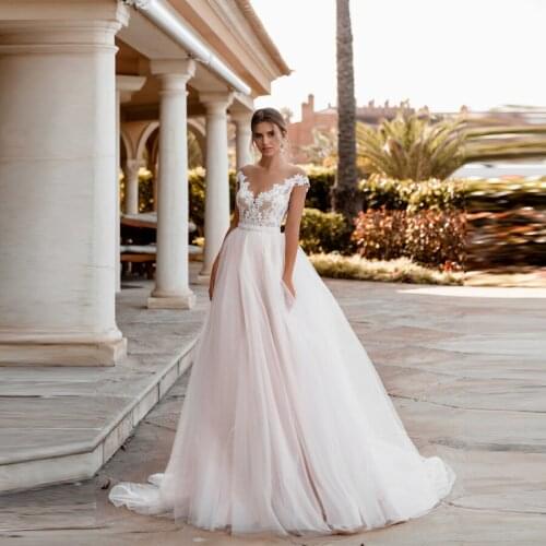 Sheer O-neck Tulle With Applique Lace Wedding Dresses Cap Sleeve Illusion Back Design Bridal Gowns vestido de noiva 2020