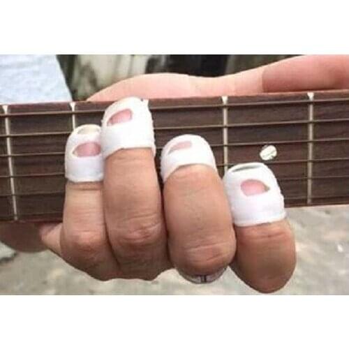 Left hand refers to the set of 4 protect small refers to pad ballad guitar children according to the string pain gloves