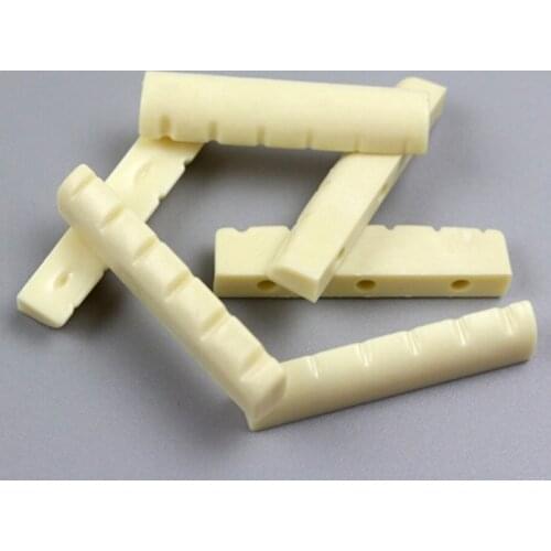 4Pieces/set Unbleached Curved Slotted guitar Bone Nut Flat Bottom For Strat