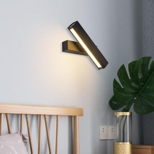 Nordic minimalist rotating creative personality bedroom bedside lamp living room background wall study reading net red wall lamp