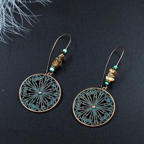 New Creative Hollow Flower Pendant Vintage Earrings for Women Round Bohemia Earrings Retro Ethnic Jewelry Accessories Wholesale
