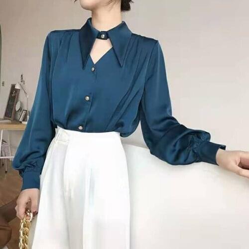 RUGOD 2021 spring temperament V-neck high-end chic shirt womens long-sleeved design sense niche drape top