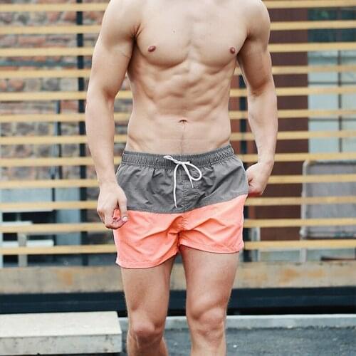 Des38 2019 new sexy patchwork color swimwear men sea holiday beach shorts quick dry surfing swim shorts men swimsuits sunga