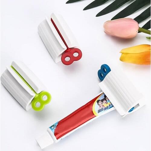New Bathroom Accessories Toothpaste Squeezer Tooth Paste Dispenser Tube Squeezer Facial Cleanser Press Rolling Holder For Kids