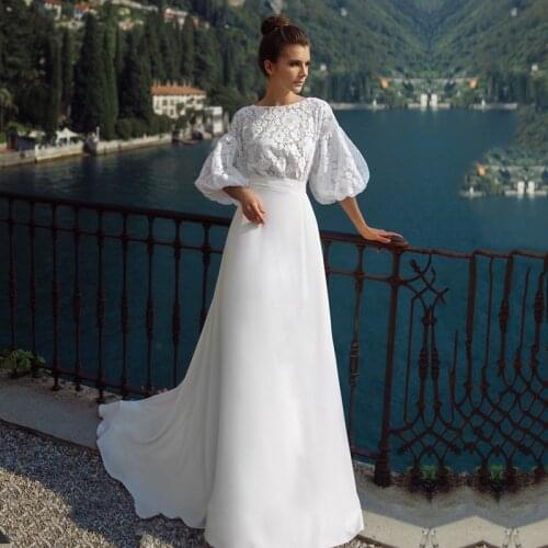 2021 Latest Unique White Lace Bridal Wedding Gowns with 3/4 Puff Sleeves Jewel Neck Wedding Dress for Bride Sweep Train Back Out