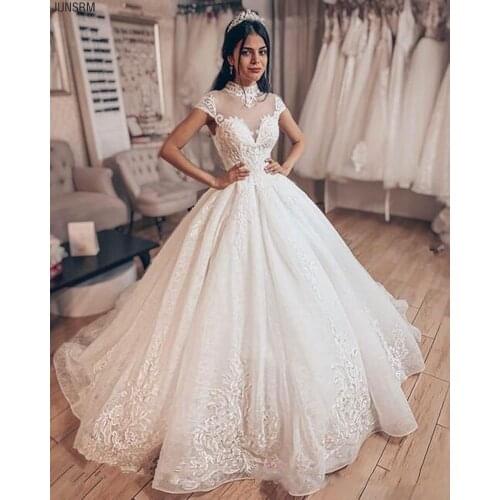 Gorgeous Princess illusion Wedding Dresses 2020 High Neck Dubai Arabic Bridal gowns Sparkly Lace Ball Gown Bridal Dress